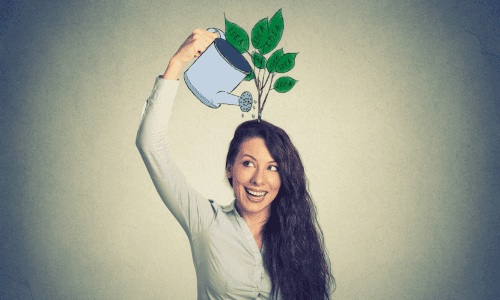 women pouring knowledge plant over head